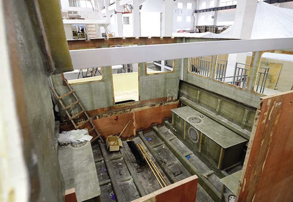 North Pacific Yachts trawler hull under construction in shipyard