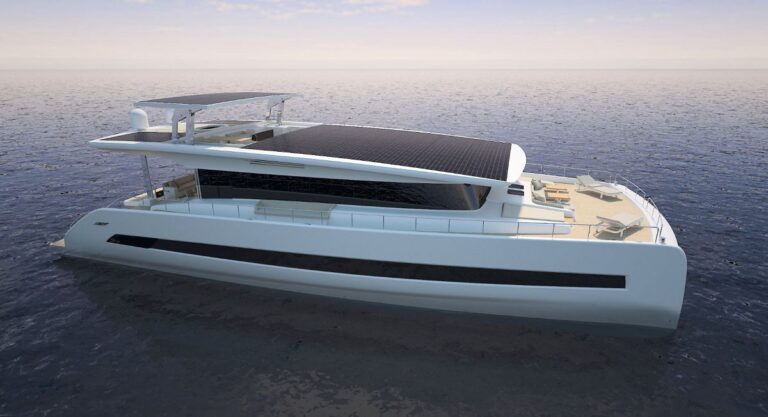 Luxury modern catamaran with solar panels cruising on calm sea